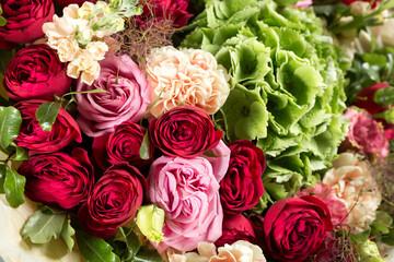 Still life with a bouquet of flowers. the florist put together a beautiful bunch of flowers. Man manual work used different types of flowers and colors. copy space
