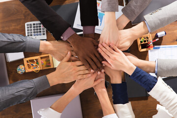 Business Team Joining Hands Together