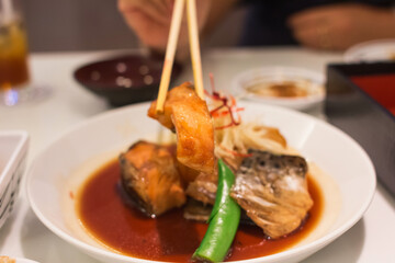 samon soup in bowl