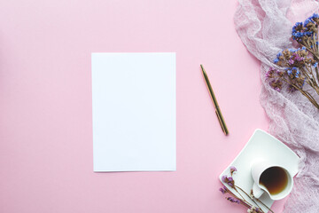 White empty paper on pink background