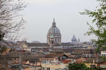 Fototapeta na wymiar The city view from the Pincian Hill with the typical houses and ancient domes of churches Rome Lazio Italy Europe