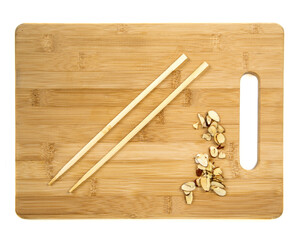 A wooden cutting board on a white background