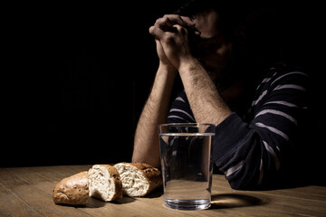 Fototapeta na wymiar Fasting for bread and water