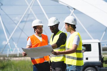 Three men on a construction site