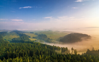 Fototapeta na wymiar Morning hazy landscape under Cross Hill, Adrspach - Teplice rocks, Czech republic, Europe.