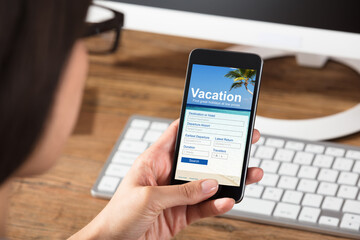 Woman Filling Online Vacation Form