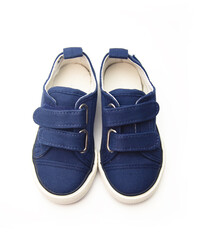 Small Pair of Shoes Isolated on a White Background