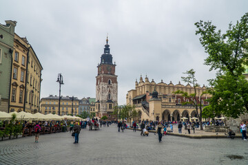 Obraz premium Town Hall Tower and Cloth Hall on Main Square of the Old Town of Krakow