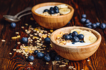 Healthy Breakfast with Granola, Banana and Blueberry.