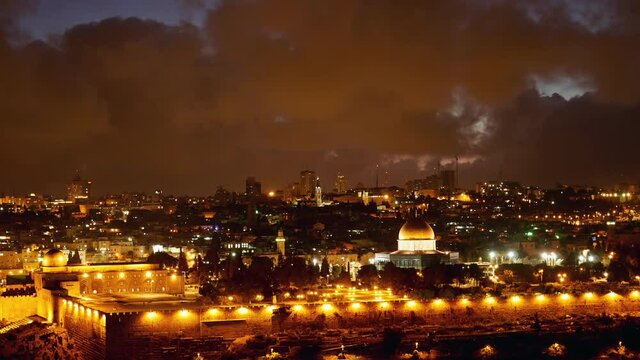 Jerusalem old city lights. Bright lights at night over Jerusalem old city Temple mount, Dome of the Rock and Al Aqsa mosque timelapse.