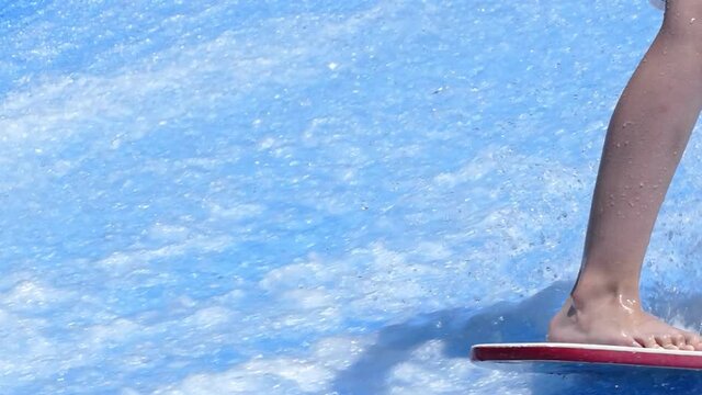 Flowboarding action on the surf machine extreme sports
