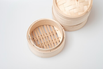 Isolated blank round steamer bamboo basket or crate