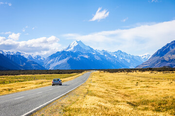 View of car on the road go to Mt. Cook, New Zealand national park at South island new zealand 