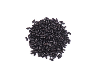 Small handful of black beans. Beans isolated on a white background. Close-up. Top view