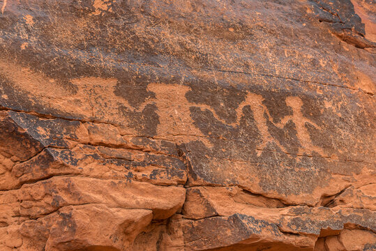  Petroglyphs along the rock wall