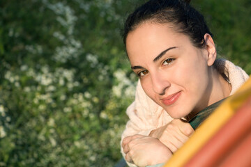 Naklejka premium Portrait of a young woman outdoors, confident.