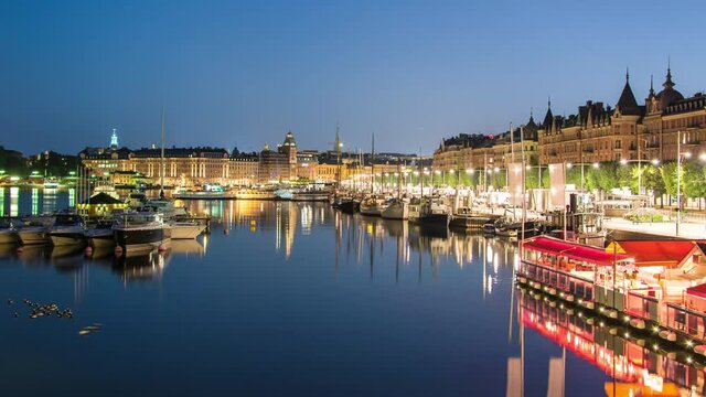 Stockholm city canal at night 4K Time Lapse. Strandvagen in central Stockholm, Sweden