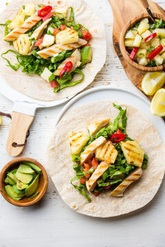 Mexican food. Chicken tacos street tacos with grilled pineapple and vegetables on white background 