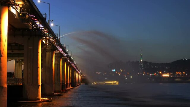 Rainbow fountain show at Banpo Bridge in Seoul city,South Korea.