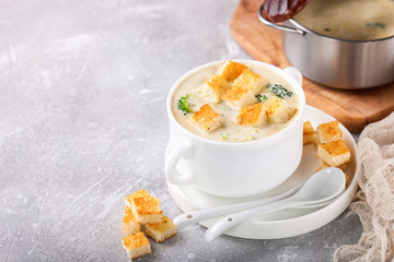 Broccoli cheese cream soup. Selective focus. Copy space