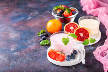 Strawberry yogurt  on a table. Selective focus. Copy space