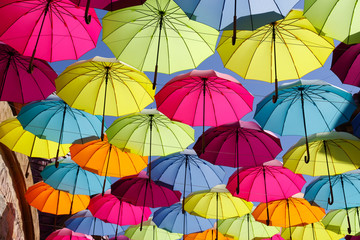 Fototapeta na wymiar colorful umbrella on the sky