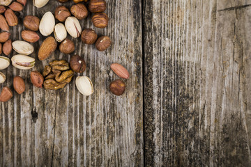 Nuts on a  wooden table