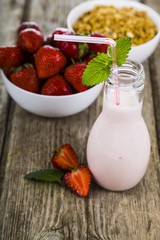 Smoothies and ripe strawberry
