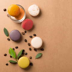 Colorful macaroons. Sweet macarons on retro  background .