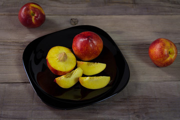 Fresh sliced peach on the plate ready to eat