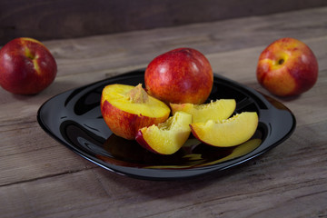 Fresh sliced peach on the plate ready to eat