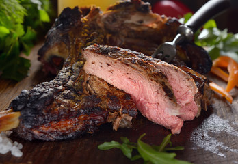 juicy grilled steaks on a cutting board