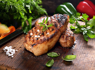 juicy grilled steaks on a cutting board