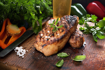 juicy grilled steaks on a cutting board