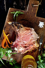 juicy grilled steaks on a cutting board