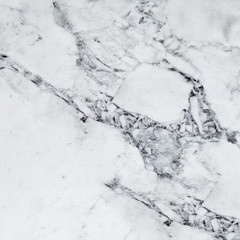 Close up of abstract artificial rock texture. Imitation white marble. Graphic arts.