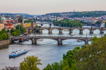 Fototapeta na wymiar Prague bridges, city sunset panorama, Czech Republic
