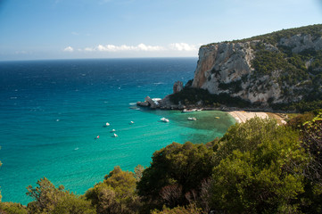 Fototapeta na wymiar Cala Luna - sandy beach on the rocky coast of Sardinia