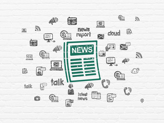 News concept: Newspaper on wall background