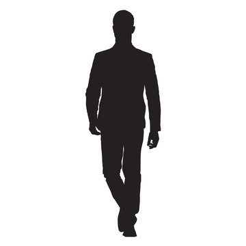 Young Business Man In Suit Goes Forward, Front View, Isolated Vector Silhouette