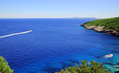 Boats at blue lagoon on Zakynthos island © Balint Radu