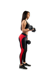 Technique exercise on the biceps with a dumbbell on a white isolated background, sports woman, one hand in a half-bent position, the second bottom