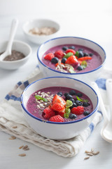 healthy berry smoothie bowl with strawberry blueberry raspberry and chia seed