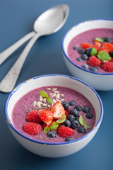 healthy berry smoothie bowl with strawberry blueberry raspberry and chia seed