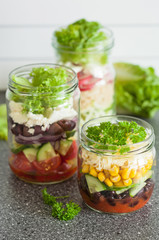 Fototapeta na wymiar healthy vegetable cheese salad in mason jars