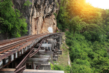 Train ride on the Death railway (river Kwai, Thailand). Death Railway train passing over the Tham Krasae Viaduct. Thai - Burma Railway