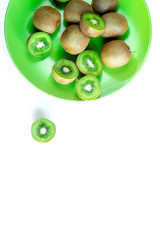 exotic fruit design with kiwi on plate on white background top view mock up