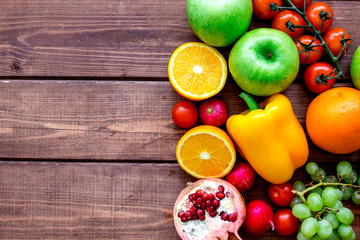 diet food with fresh fruits and vegetables salad wooden background top view mockup