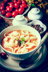 Fresh tomato soup with conchigliette. Instagram style filtred image.