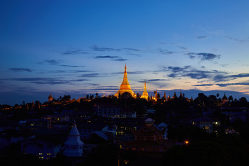 Yangon, Myanmar view of Shwedagon Pagoda at dusk.